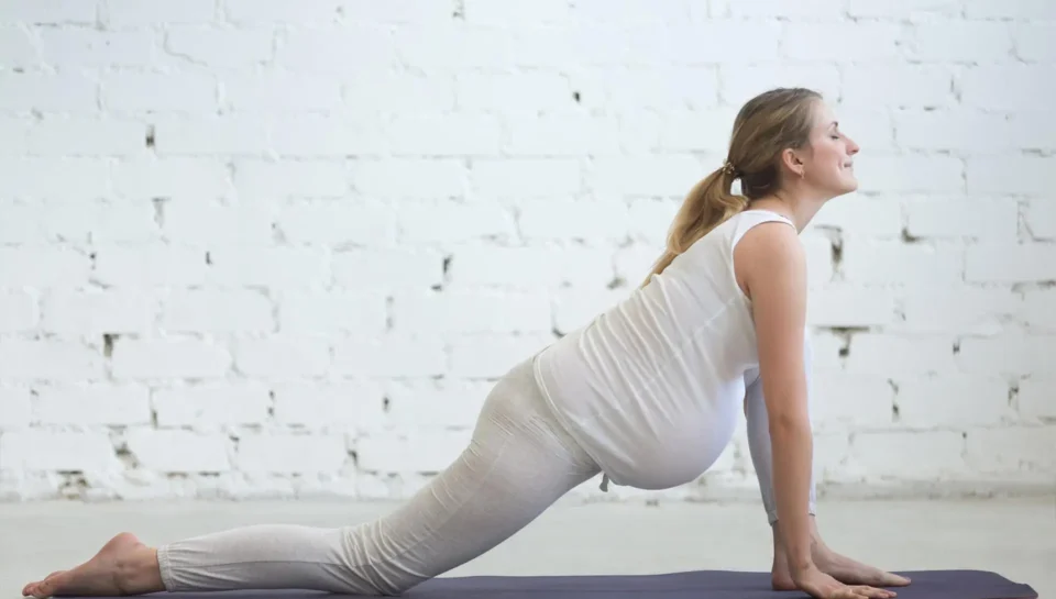woman-pelvic-health pregnant woman stretching